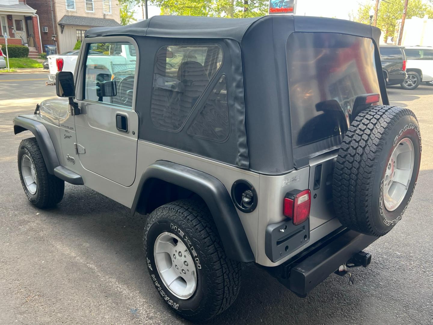 2001 SILVER Jeep Wrangler Sport (1J4FA49S21P) with an 4.0L L6 OHV 12V engine, located at 1018 Brunswick Ave, Trenton, NJ, 08638, (609) 989-0900, 40.240086, -74.748085 - Photo#2